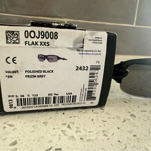 Kids Oakley sunglassess.  Never worn, still have stickers on lens.